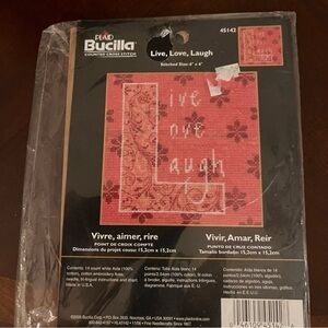 Plaid bucilla live, laugh, love cross stitch kit